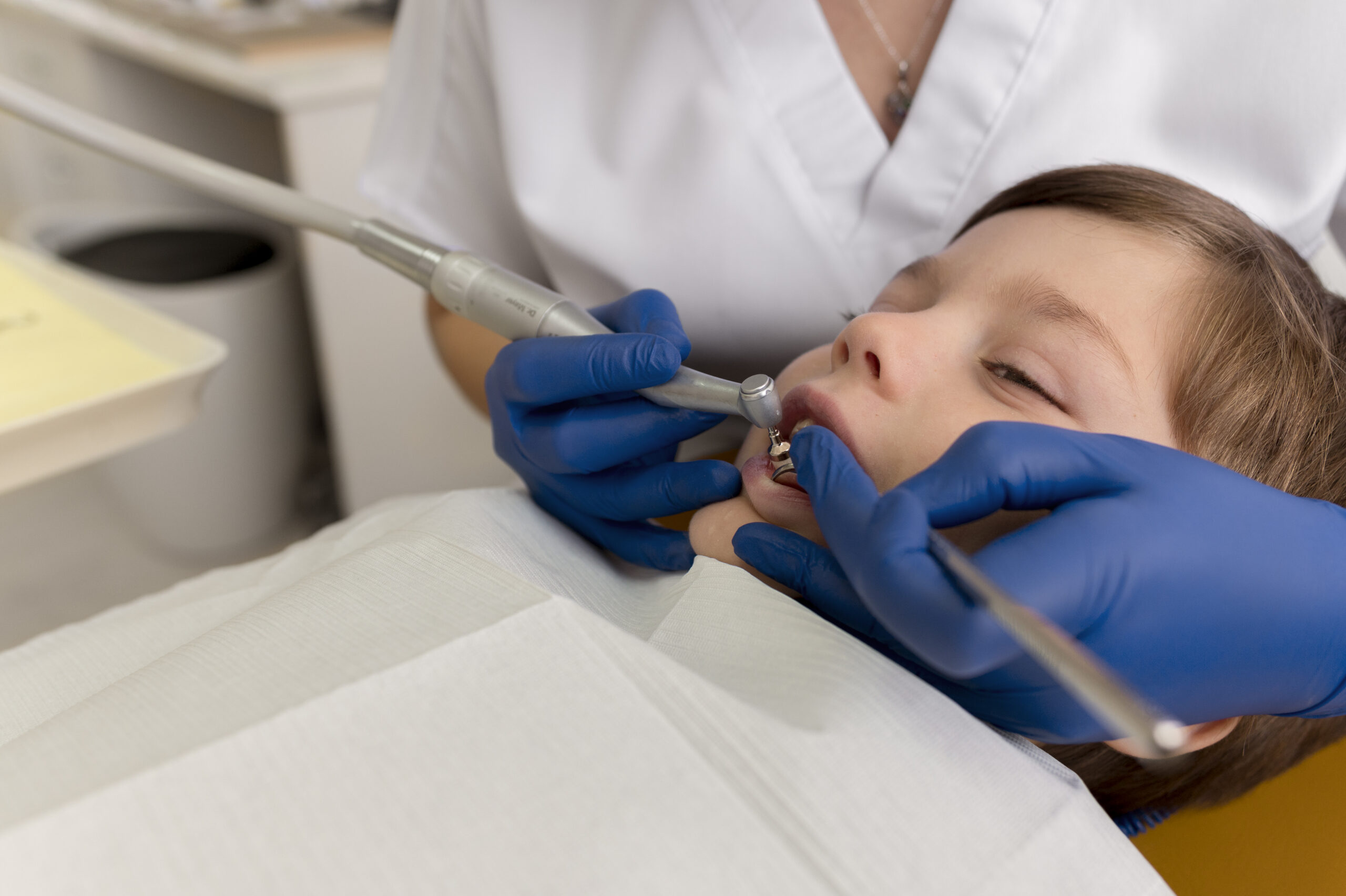 dentist-cleaning-child-s-teeth (1)