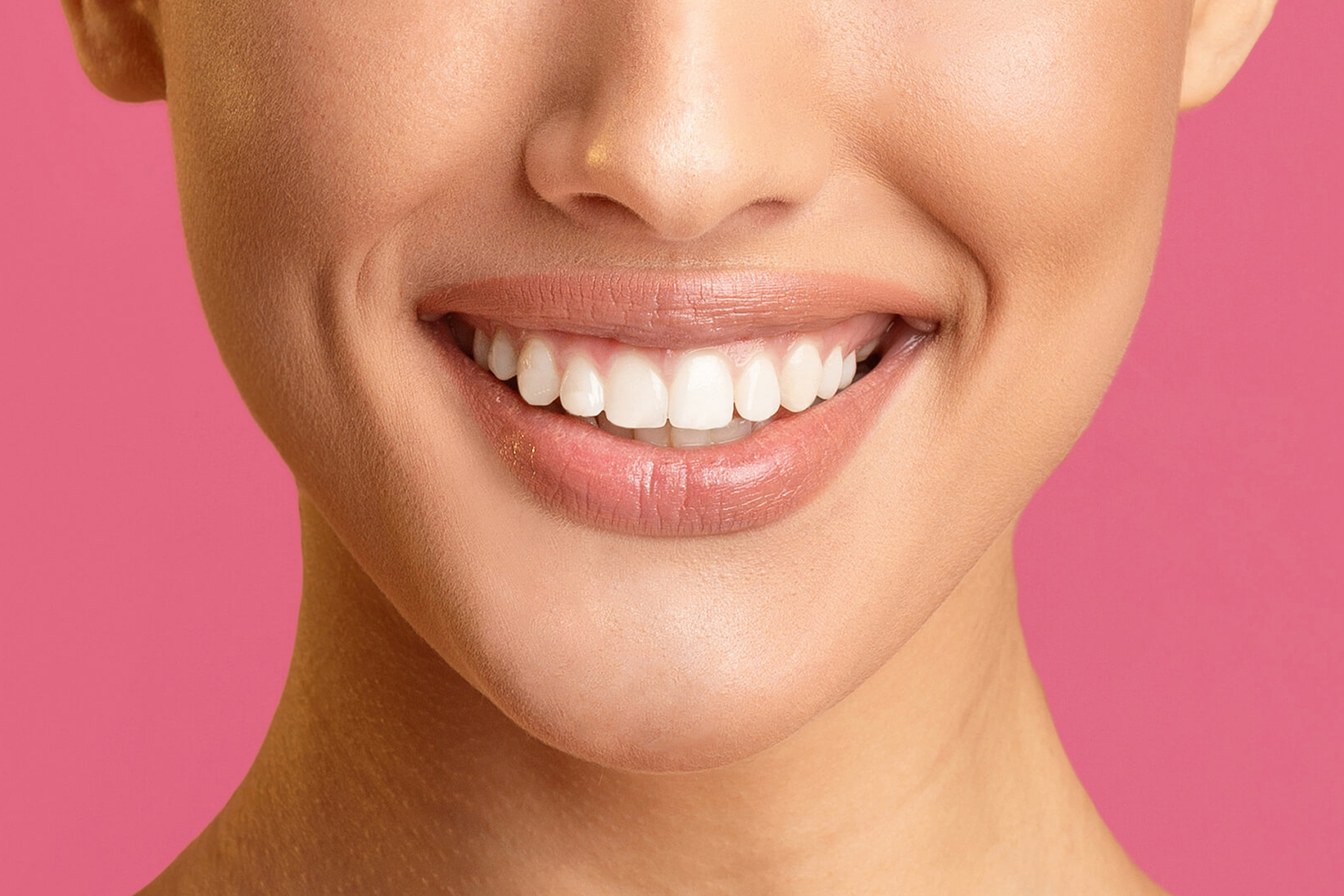 medium-vecteezy_this-image-shows-a-close-up-view-of-a-womans-mouth-smiling_50878366_medium (1) 1